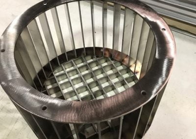 flow conditioning basket for greene machine